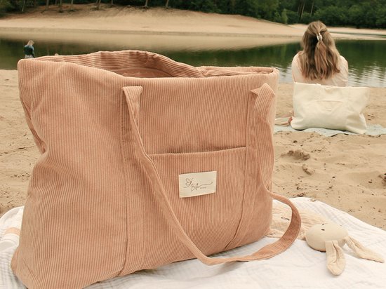 voorbeeld luiertas tijdloos op strand